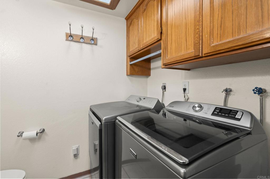1848 Tavern Road Alpine, CA 91901 - Photo 40 of 45 a utility room with dryer and washer