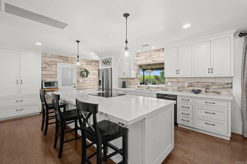 1848 Tavern Road Alpine, CA 91901 - Photo 8 of 45 a kitchen with appliances a sink and cabinets