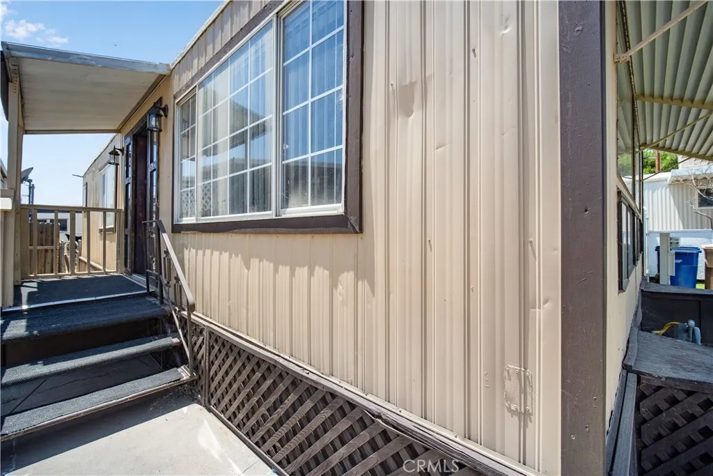 348 Petrol Road Bakersfield, CA 93308 - Photo 6 of 21 a view of a balcony with wooden floor