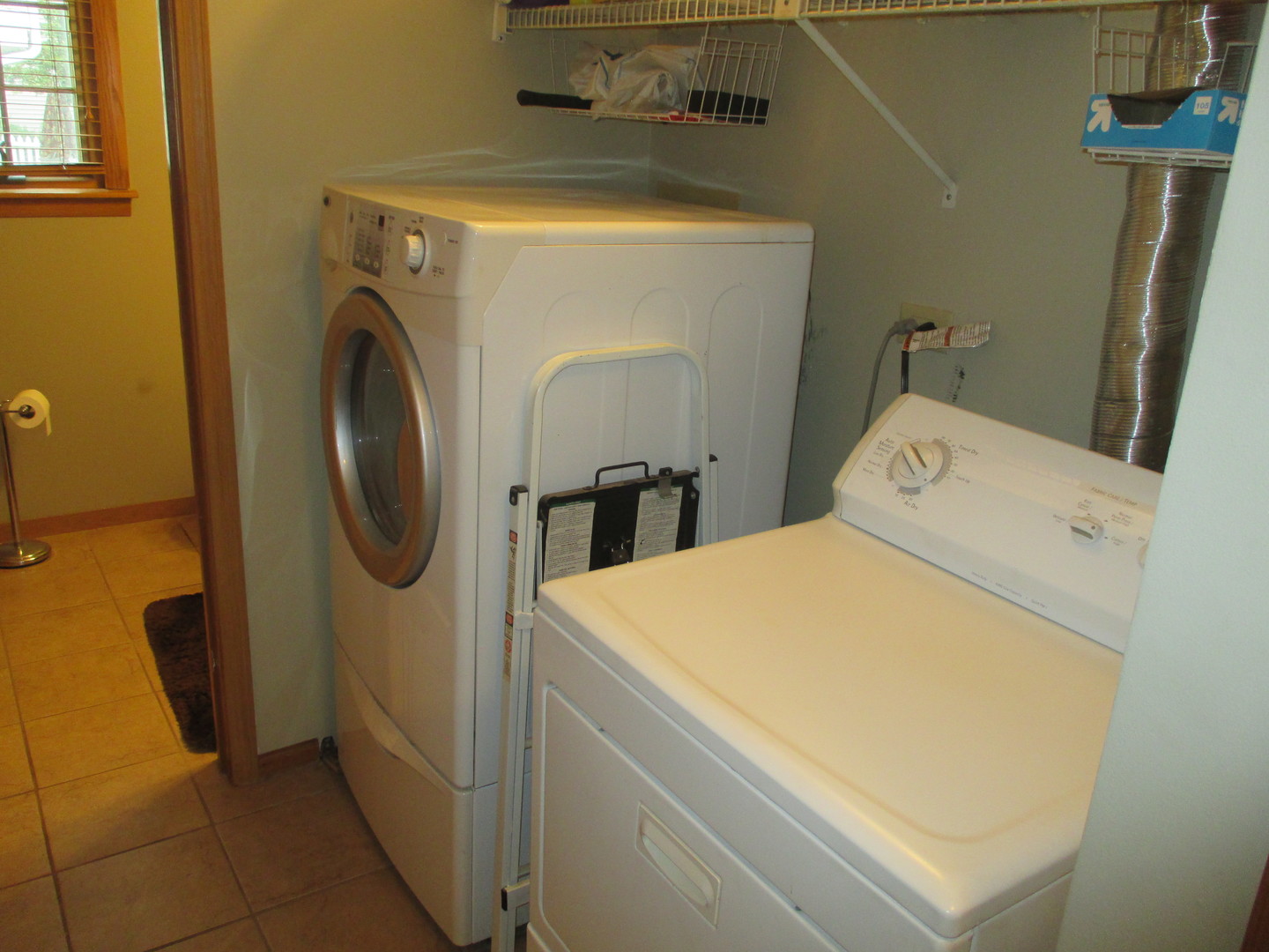30W261 Mack Road Warrenville, IL 60555 - Photo 24 of 28 a utility room with dryer and washer