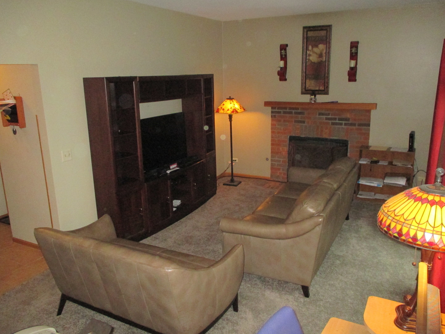 30W261 Mack Road Warrenville, IL 60555 - Photo 8 of 28 a living room with furniture and a fireplace