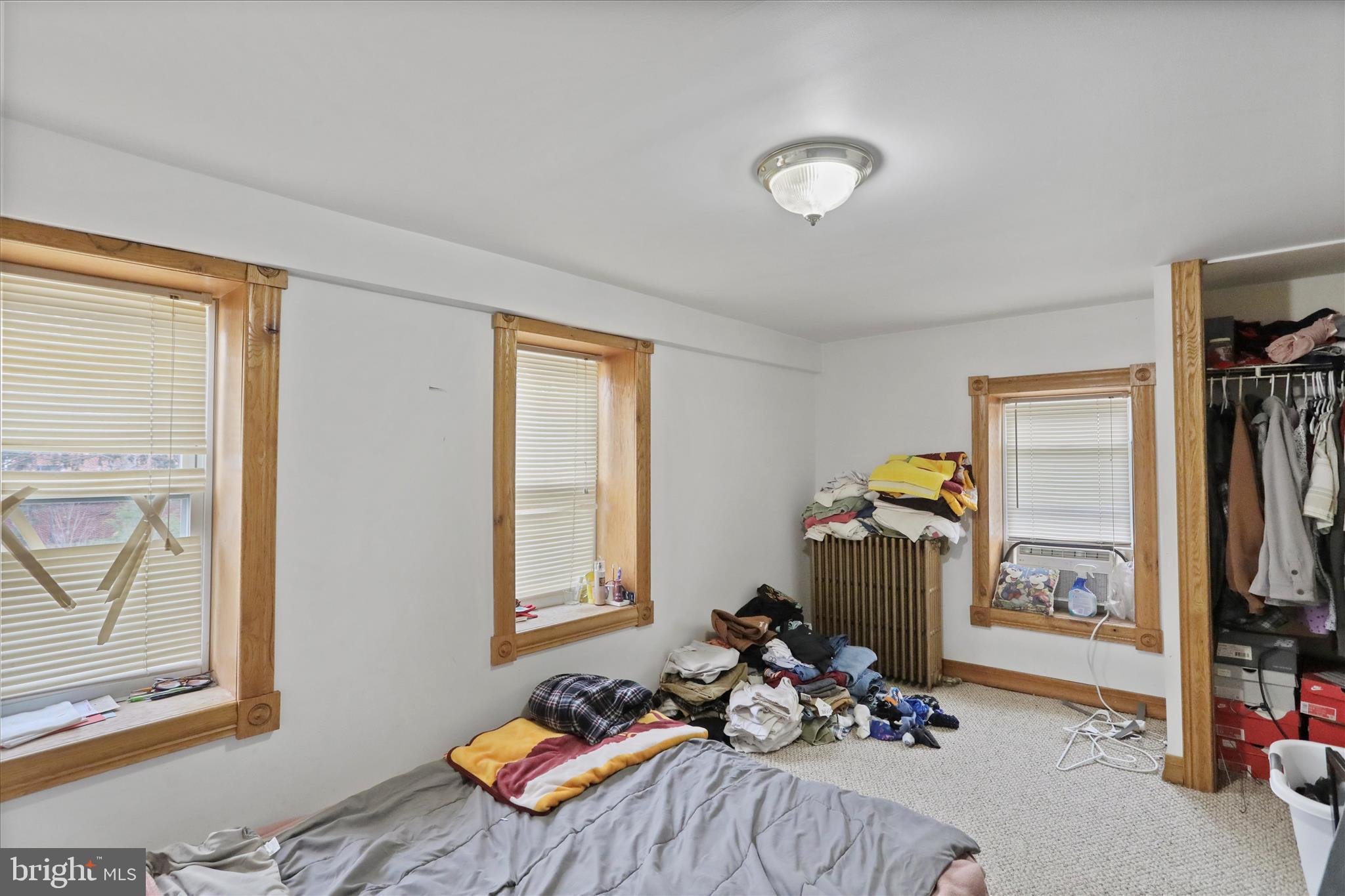 20 East Madison Street Greencastle, PA 17225 - Photo 15 of 36 a bedroom with furniture and a window