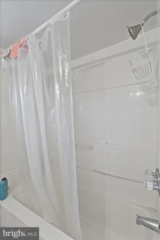 a view of stairs and with furniture