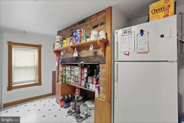 a workspace with furniture and window