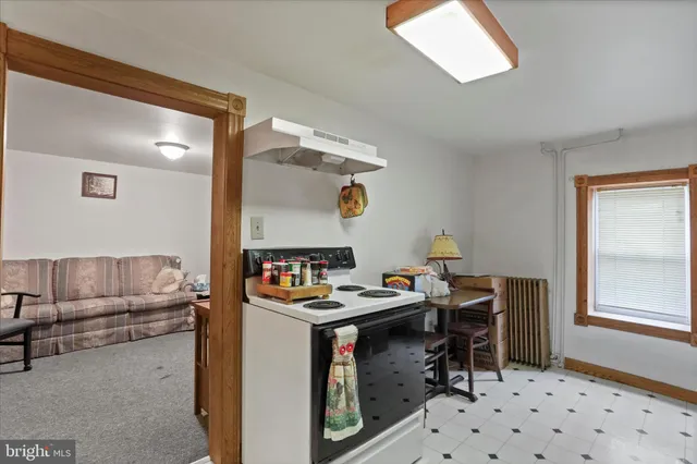 a kitchen with lots of appliances