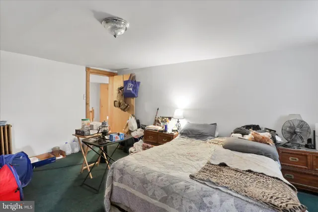 a view of staircase with rug floor