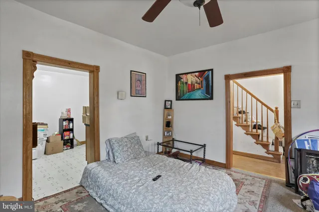 a bedroom with furniture and window