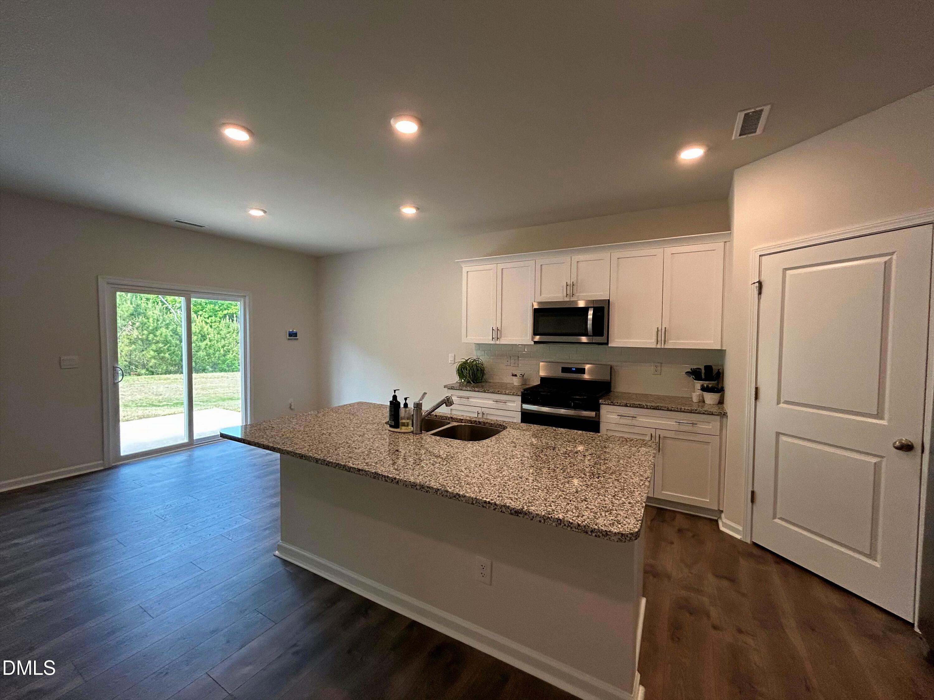 2264 Fletchers Ridge Drive Durham, NC 27703 - Photo 9 of 41 11. Another look at the kitchen & dining