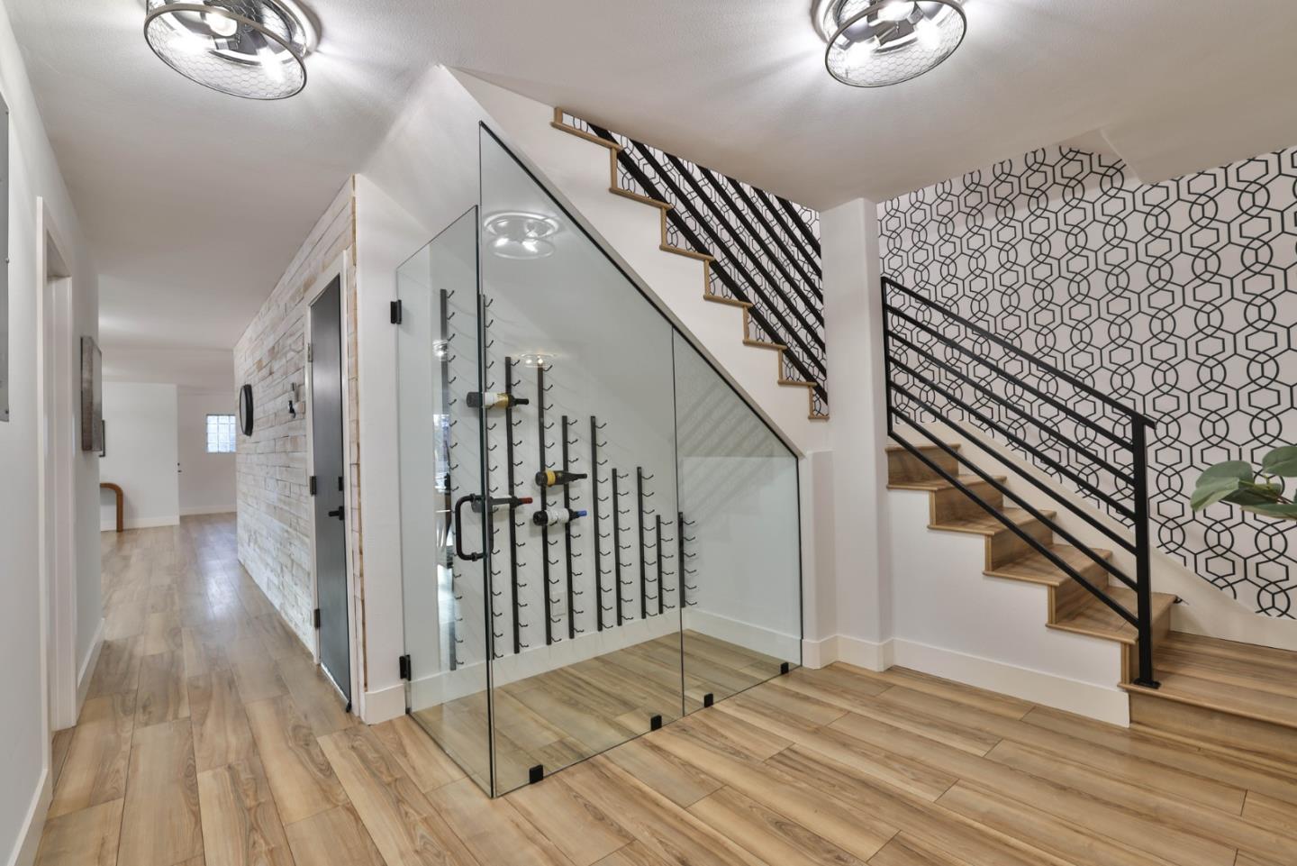 1280 Burrows Road Campbell, CA 95008 - Photo 14 of 47 a view of a hallway with wooden floor and stairs