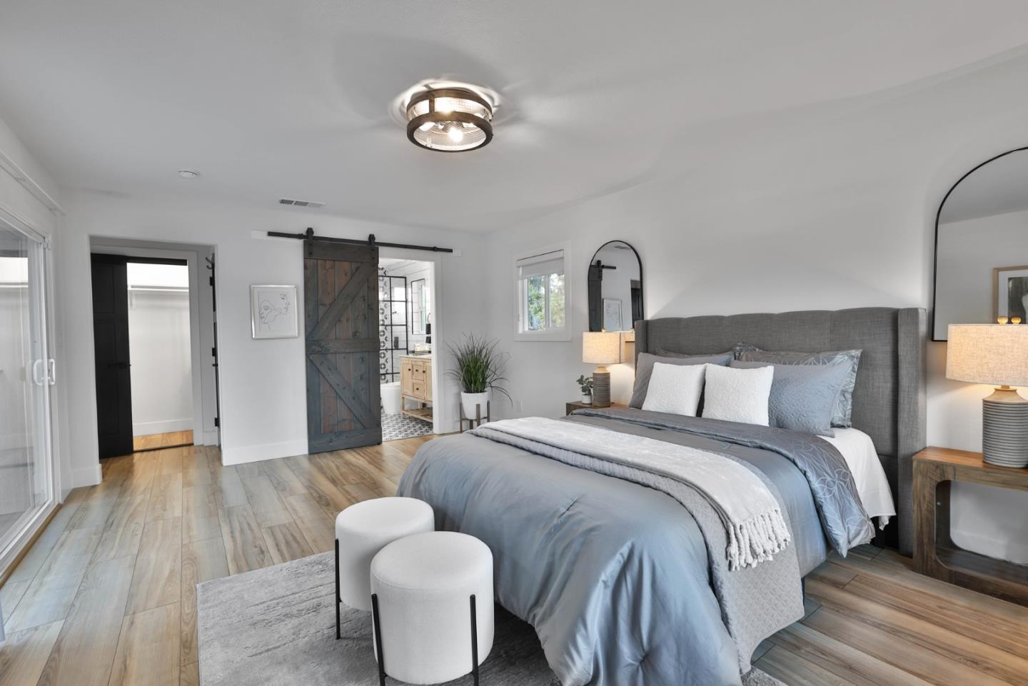 1280 Burrows Road Campbell, CA 95008 - Photo 18 of 47 a spacious bedroom with a bed and a chandelier