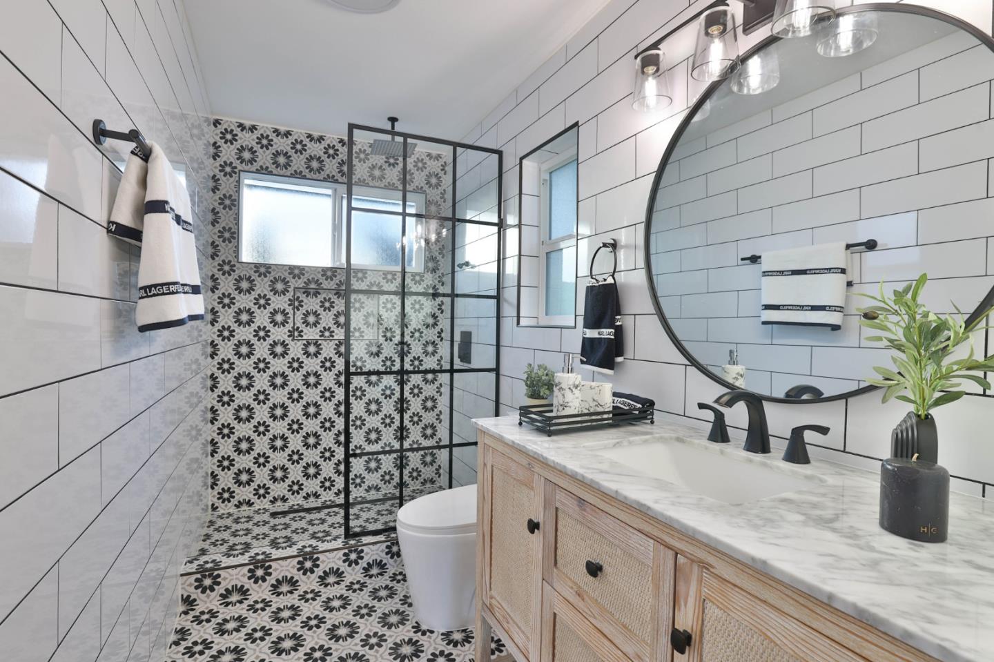 1280 Burrows Road Campbell, CA 95008 - Photo 19 of 47 a bathroom with a sink a toilet and shower