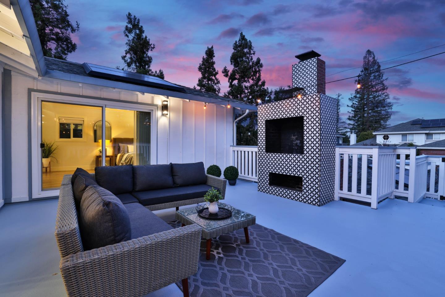 1280 Burrows Road Campbell, CA 95008 - Photo 25 of 47 a living room with furniture a flat screen tv and a fireplace