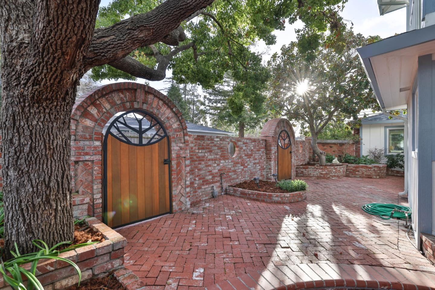 1280 Burrows Road Campbell, CA 95008 - Photo 29 of 47 a front view of a house with garden