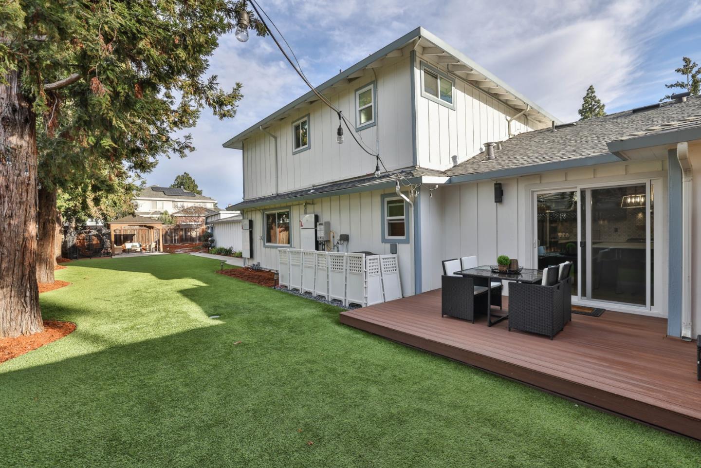 1280 Burrows Road Campbell, CA 95008 - Photo 35 of 47 a view of a house with backyard sitting area and garden