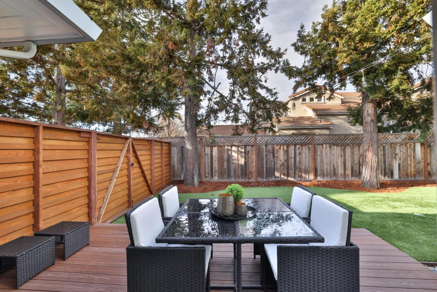 1280 Burrows Road Campbell, CA 95008 - Photo 43 of 47 a view of deck with furniture and trees in the background
