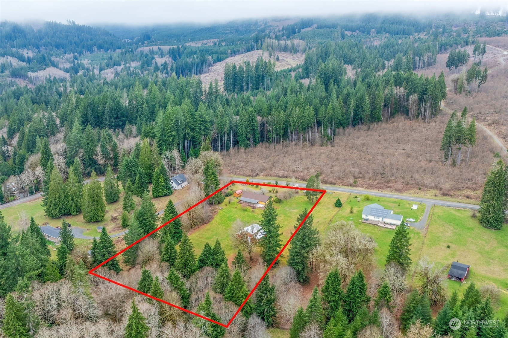 521 Robertson Road Longview, WA 98632 - Photo 39 of 40 an aerial view of residential houses with outdoor space and trees