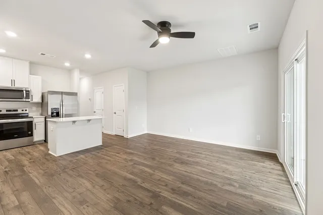 a bathroom with a sink a mirror and a shower