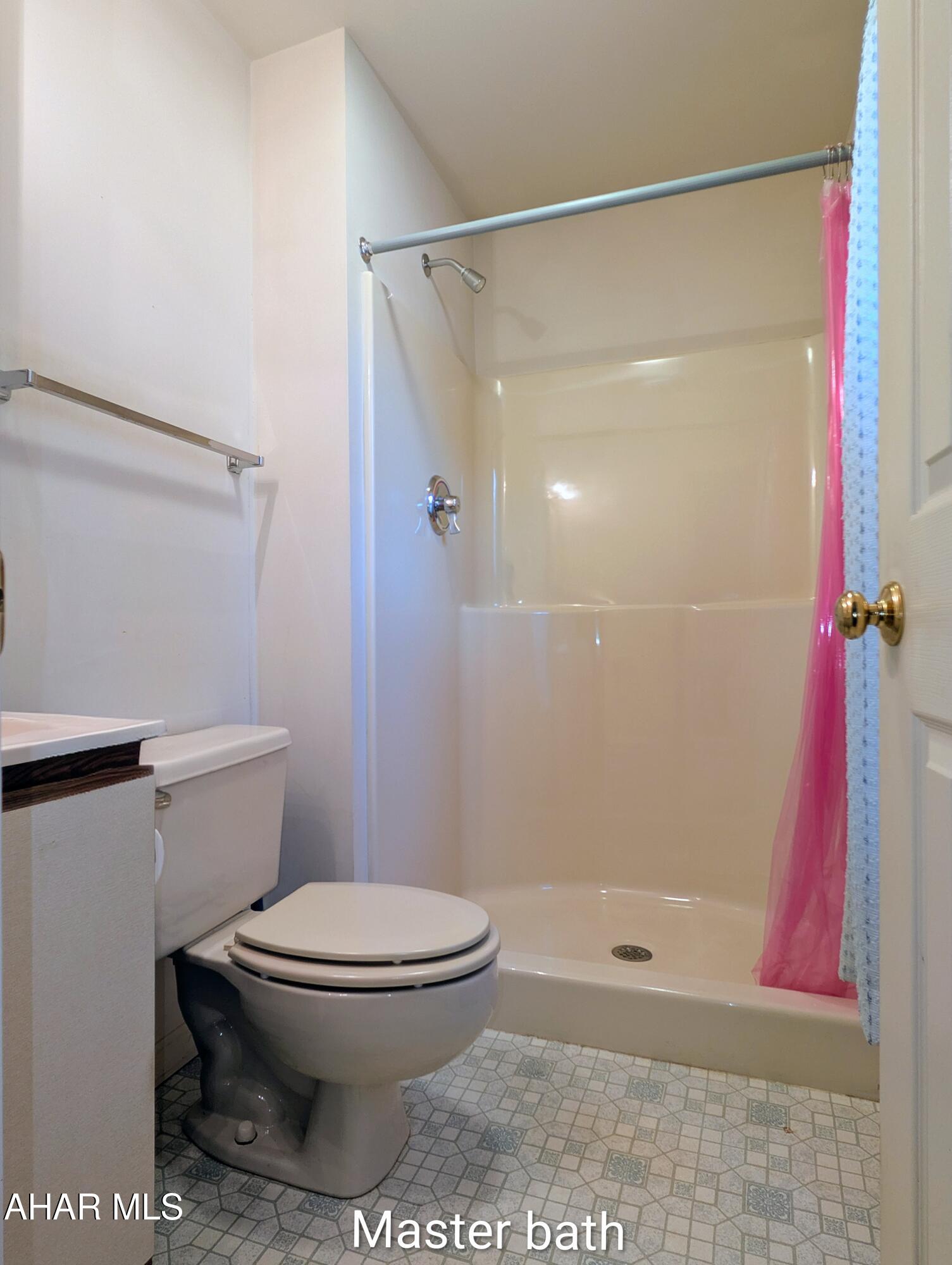 147 Pine Street Hyndman, PA 15545 - Photo 20 of 44 a bathroom with a shower and a toilet