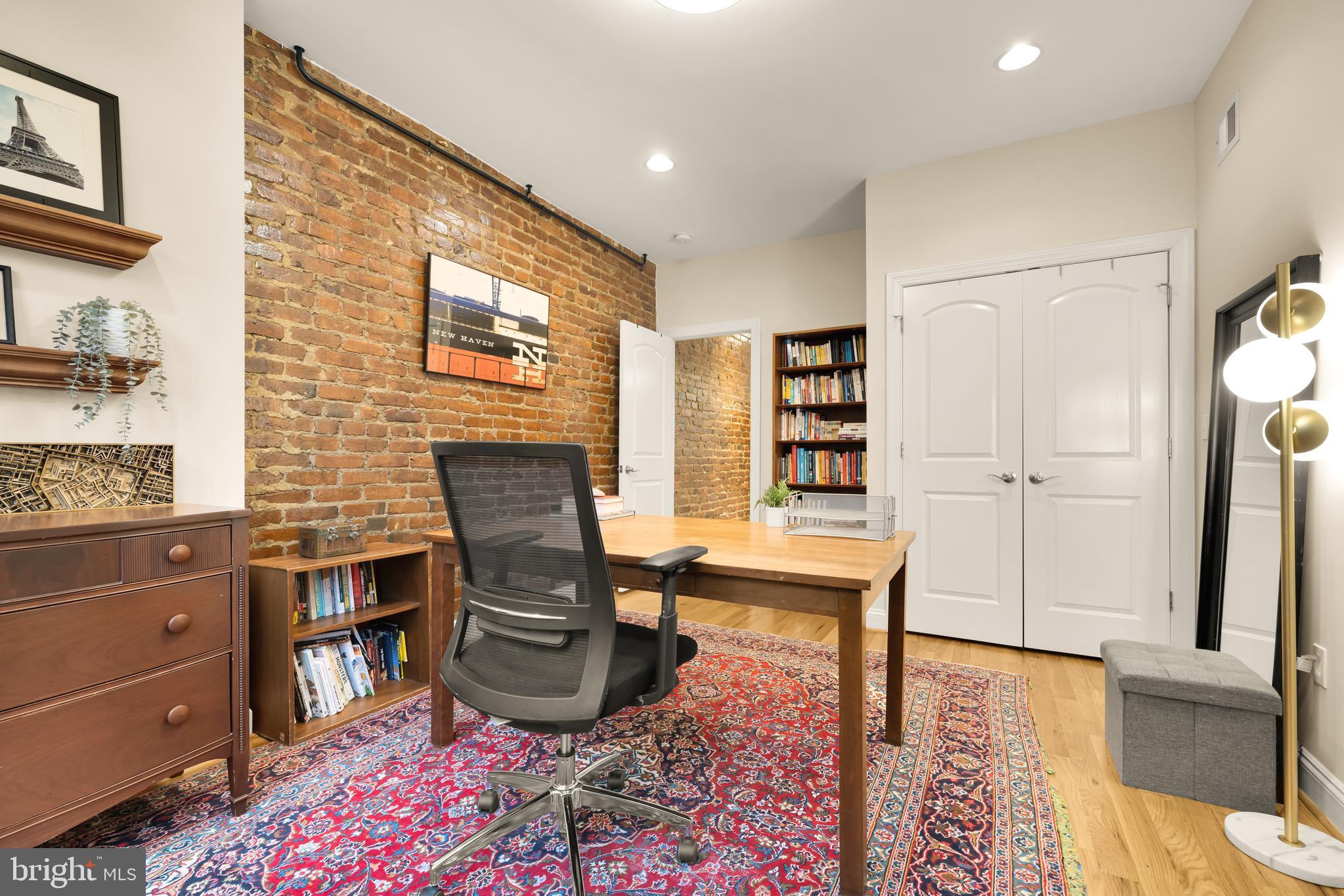 1813 Kilbourne Place Northwest Washington, DC 20010 - Photo 42 of 69 Large closet and exposed brick