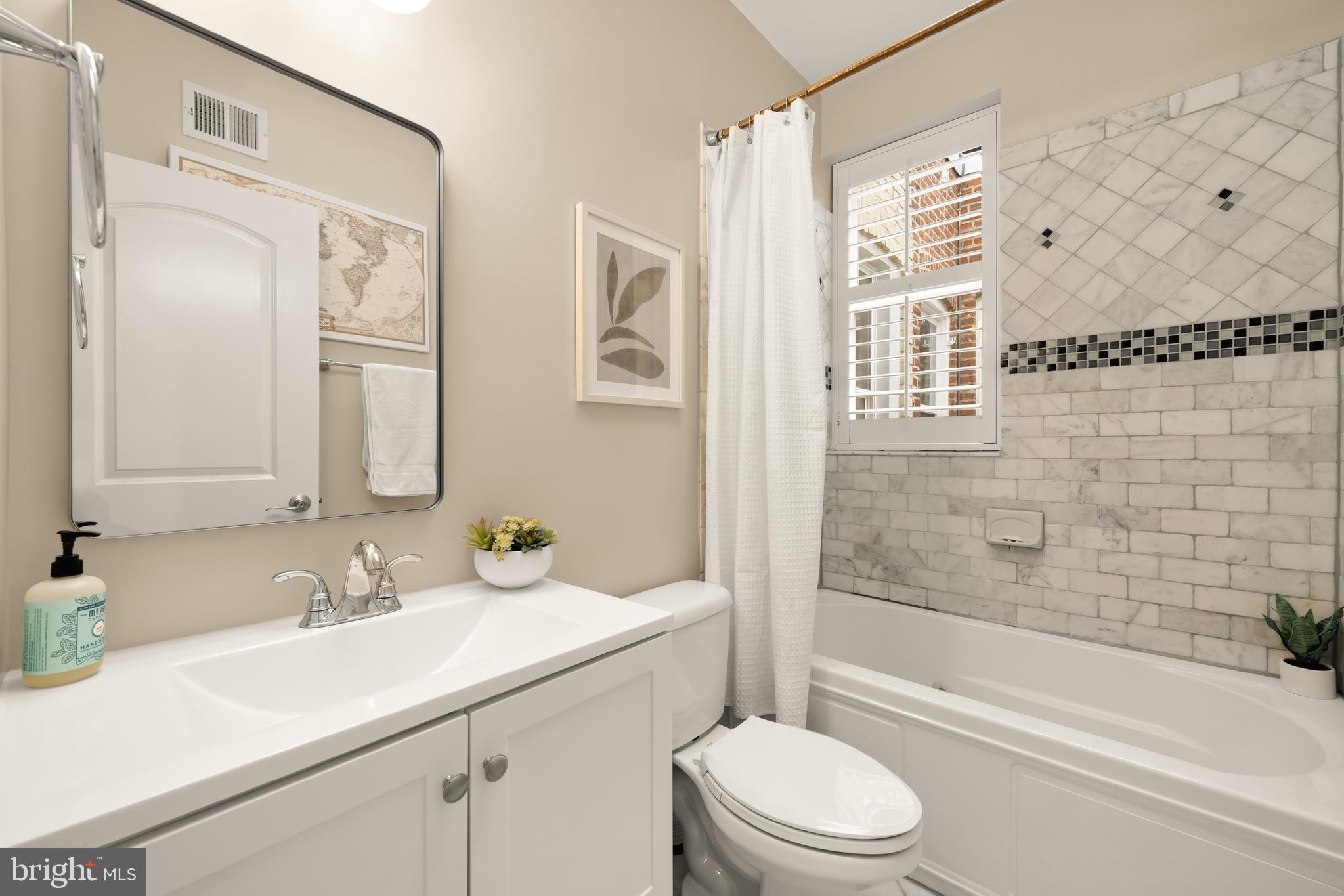 1813 Kilbourne Place Northwest Washington, DC 20010 - Photo 43 of 69 Updated hall bathroom