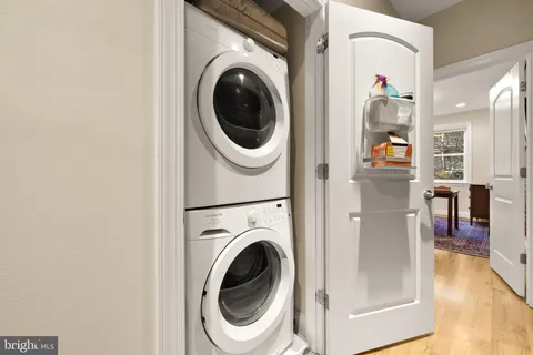 a kitchen with stainless steel appliances a refrigerator stove microwave and cabinets