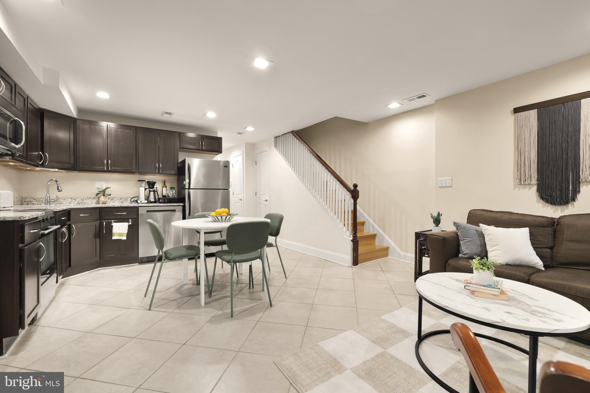 1813 Kilbourne Place Northwest Washington, DC 20010 - Photo 48 of 69 Lower-level living room/rec space with full kitche