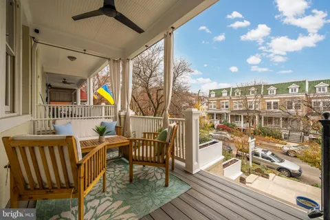 a view of a chairs and table in a patio