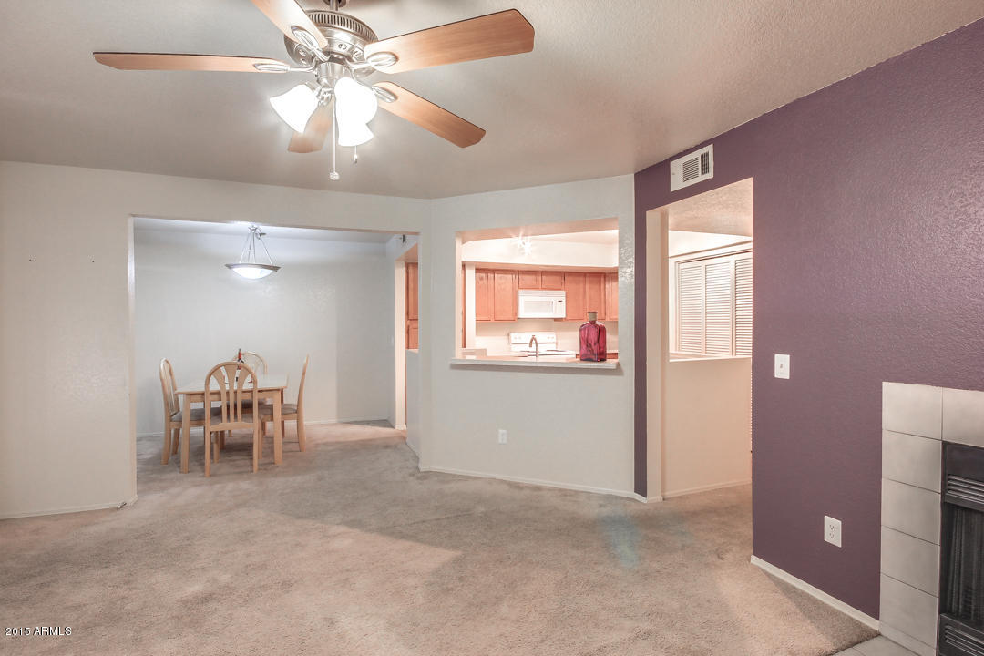 1331 West Baseline Road, Unit 273 Mesa, AZ 85202 - Photo 8 of 24 Living Room with Fireplace