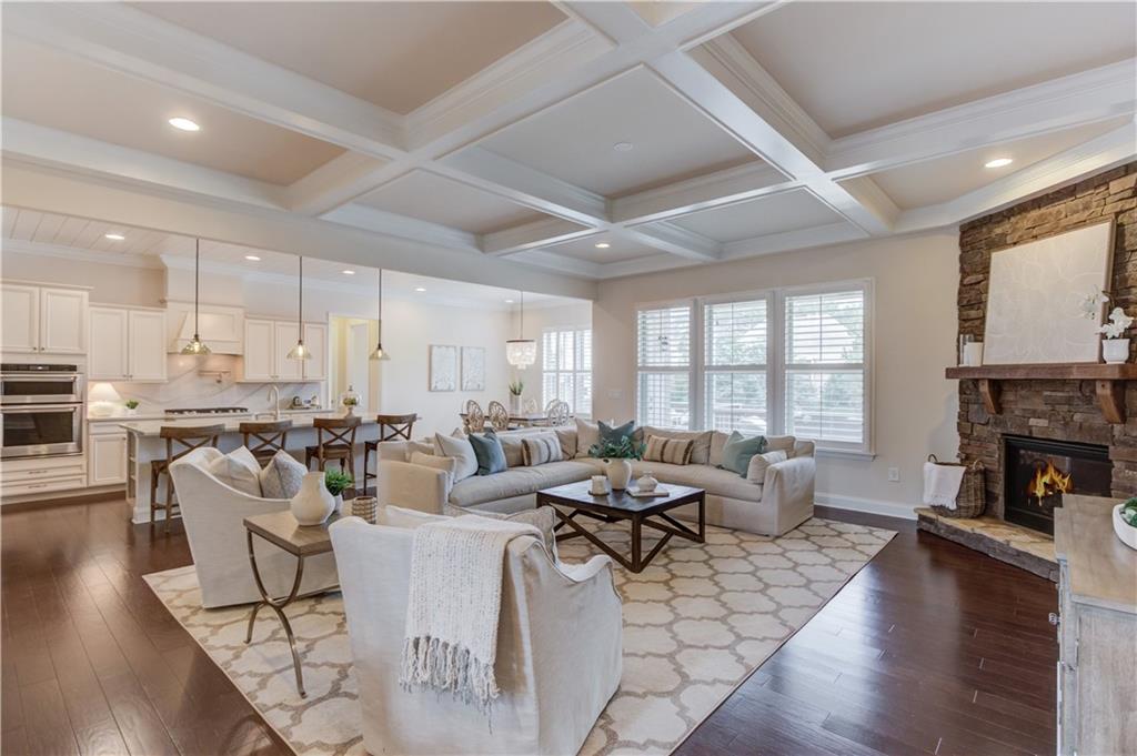 632 Rio Vista Court Suwanee, GA 30024 - Photo 11 of 64 a living room with fireplace furniture and a large window