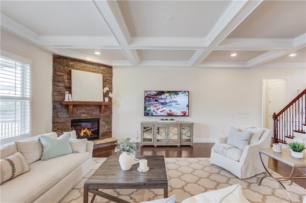 632 Rio Vista Court Suwanee, GA 30024 - Photo 13 of 64 a living room with fireplace furniture and a fireplace