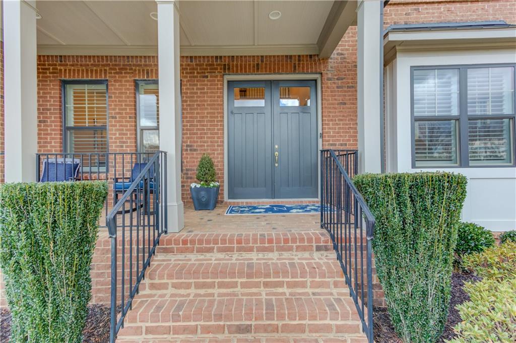 632 Rio Vista Court Suwanee, GA 30024 - Photo 3 of 64 a front view of a house with a porch