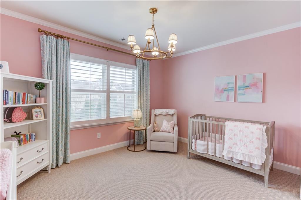 632 Rio Vista Court Suwanee, GA 30024 - Photo 44 of 64 a spacious bedroom with furniture and a window