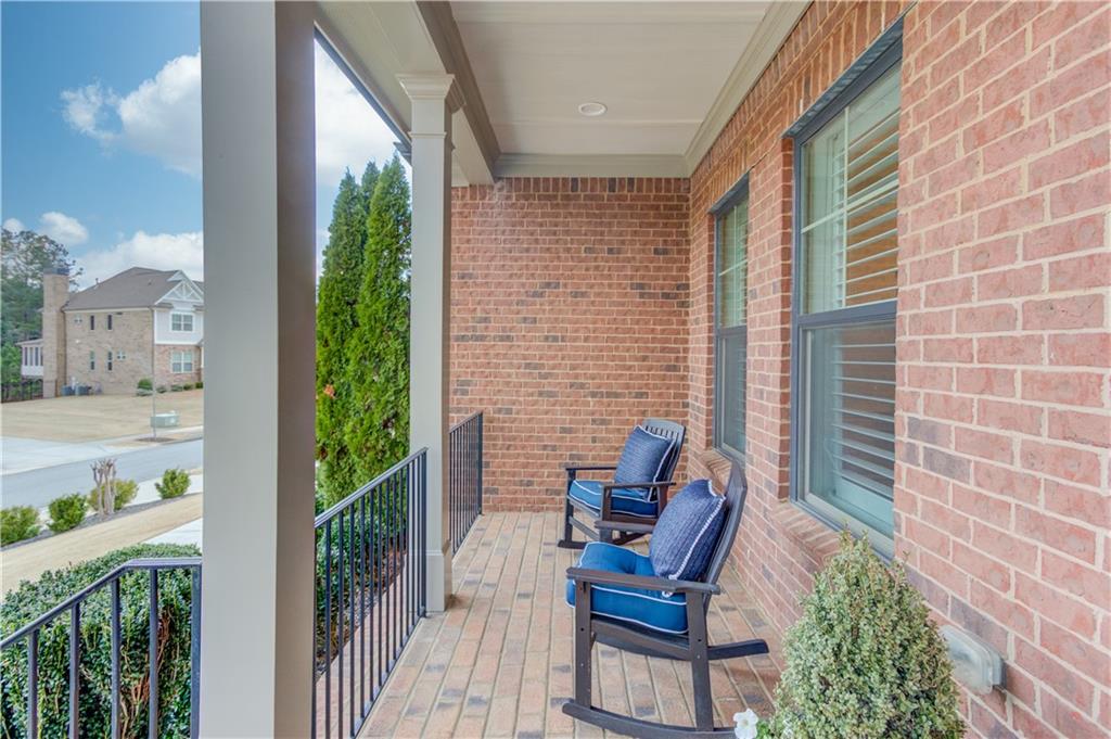 632 Rio Vista Court Suwanee, GA 30024 - Photo 5 of 64 a view of chair and table in patio with wooden fence