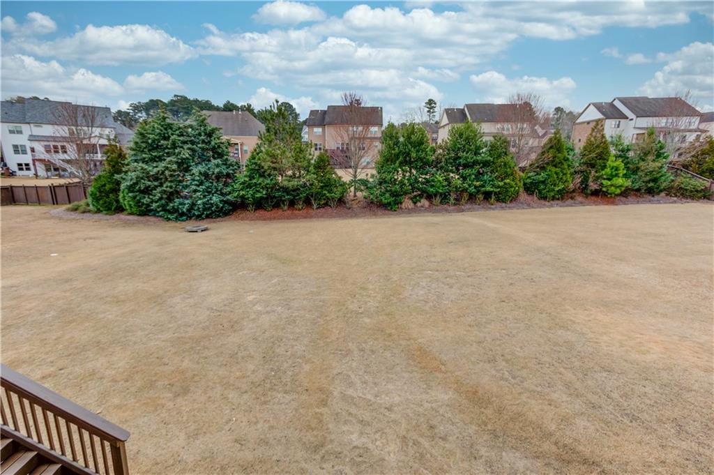 632 Rio Vista Court Suwanee, GA 30024 - Photo 54 of 64 a view of a city street with a building in the background