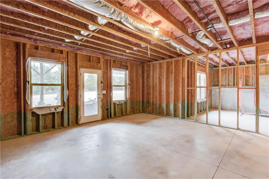 632 Rio Vista Court Suwanee, GA 30024 - Photo 57 of 64 a view of an empty room with windows