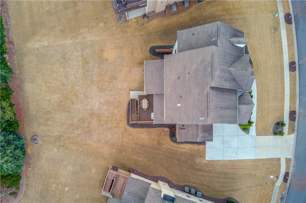 632 Rio Vista Court Suwanee, GA 30024 - Photo 60 of 64 an aerial view of residential houses with outdoor space
