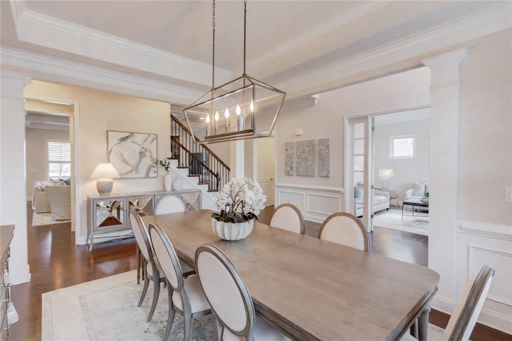 632 Rio Vista Court Suwanee, GA 30024 - Photo 6 of 64 a dining room with furniture and wooden floor