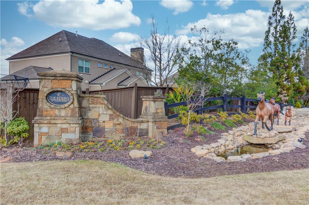 632 Rio Vista Court Suwanee, GA 30024 - Photo 61 of 64 a backyard of a house with barbeque oven table and chairs