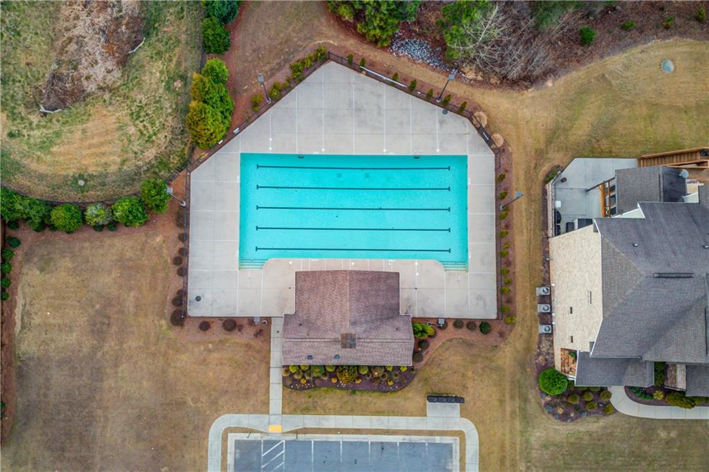 632 Rio Vista Court Suwanee, GA 30024 - Photo 63 of 64 an aerial view of a house with a yard and a garage