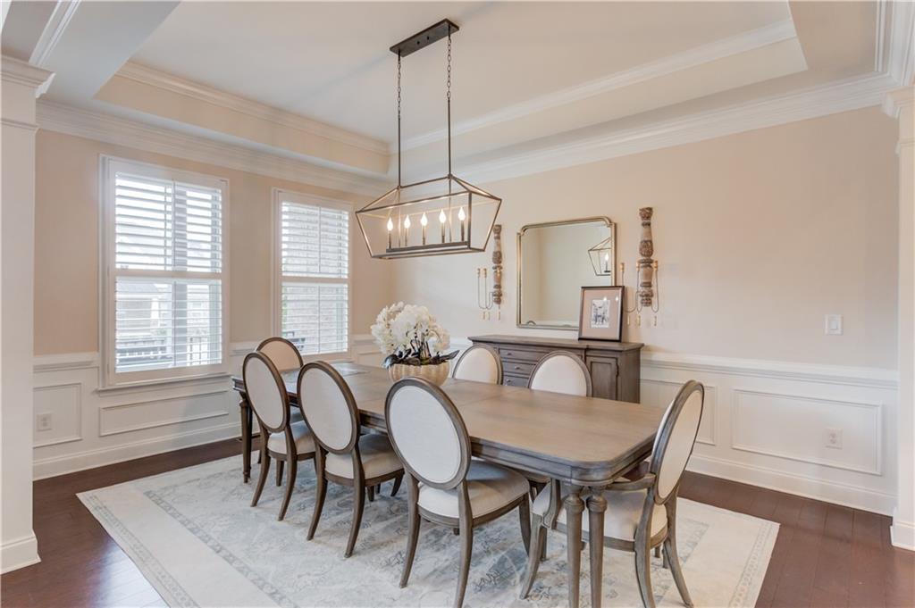 632 Rio Vista Court Suwanee, GA 30024 - Photo 7 of 64 a view of a dining room with furniture window and wooden floor