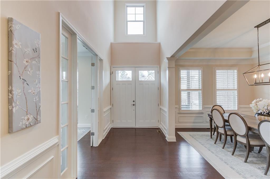 632 Rio Vista Court Suwanee, GA 30024 - Photo 8 of 64 a view of a hallway with furniture and windows