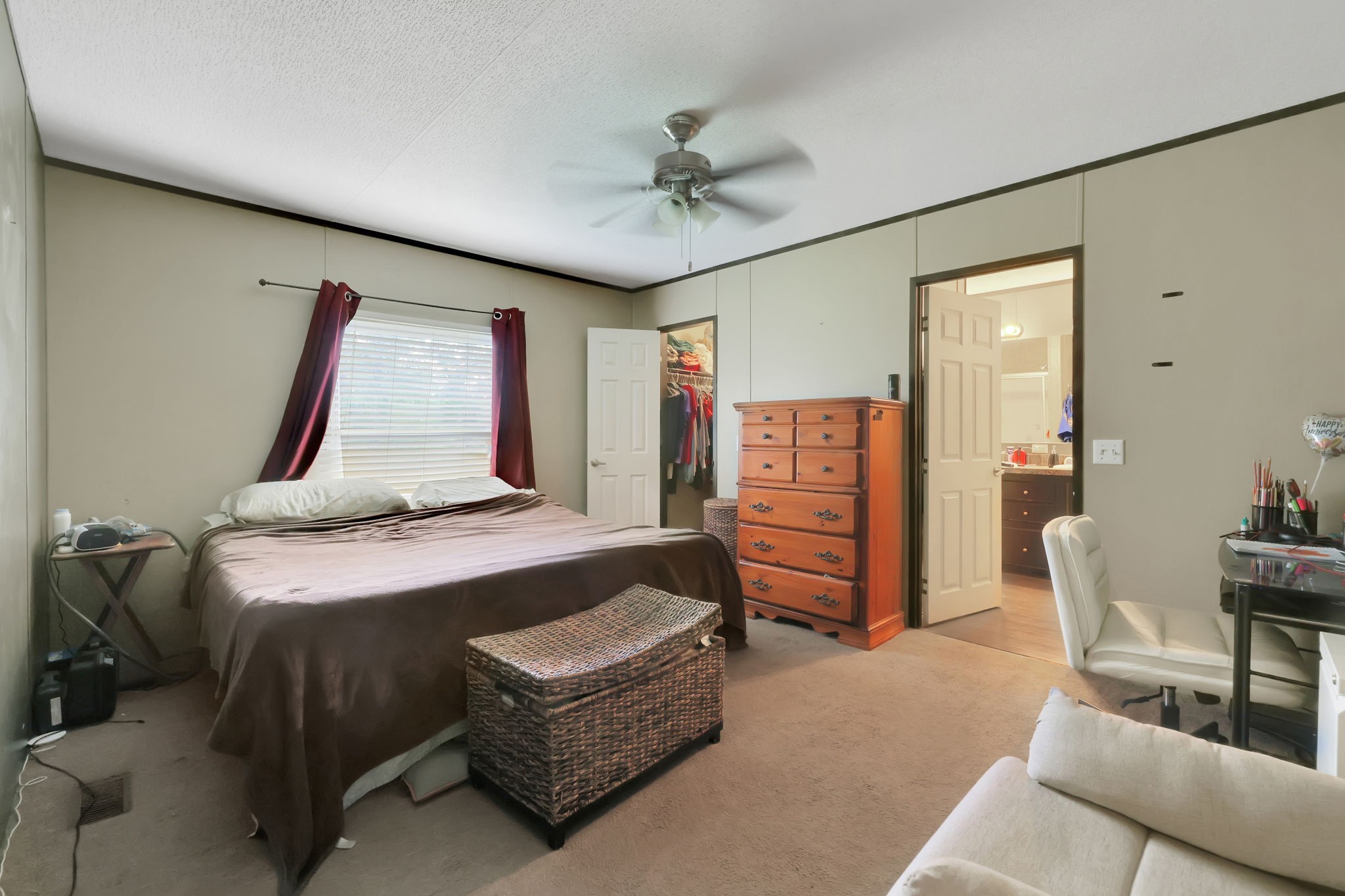 103 Sunset Lane Somerville, TX 77879 - Photo 27 of 43 a bedroom with a bed and dresser