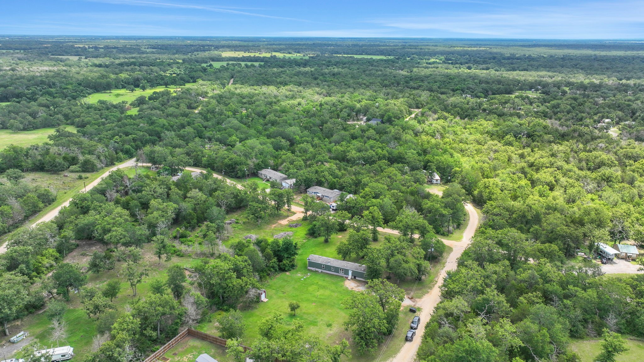 103 Sunset Lane Somerville, TX 77879 - Photo 29 of 42 a view of a green field with lots of bushes