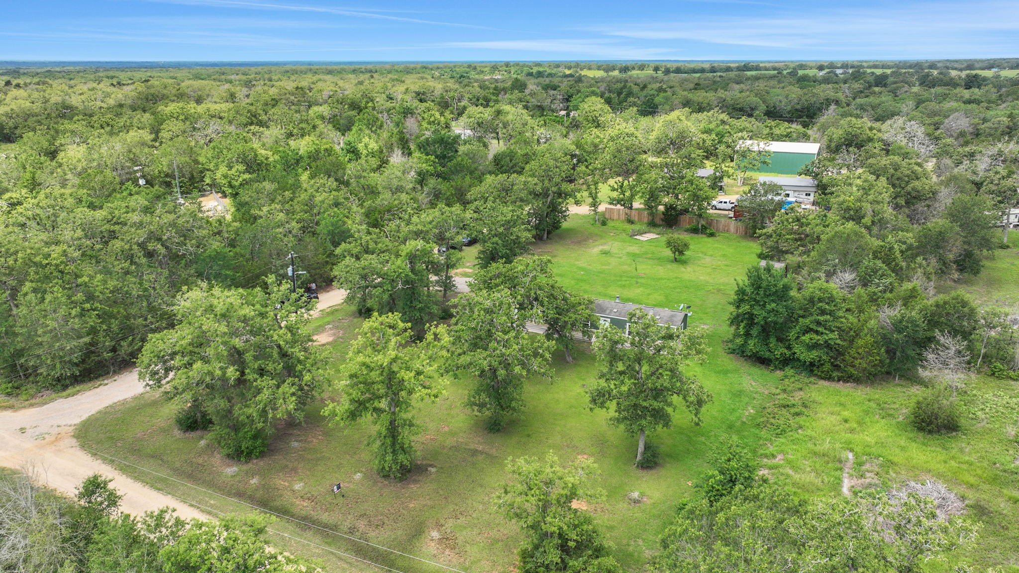 103 Sunset Lane Somerville, TX 77879 - Photo 33 of 42 a view of a garden with an ocean