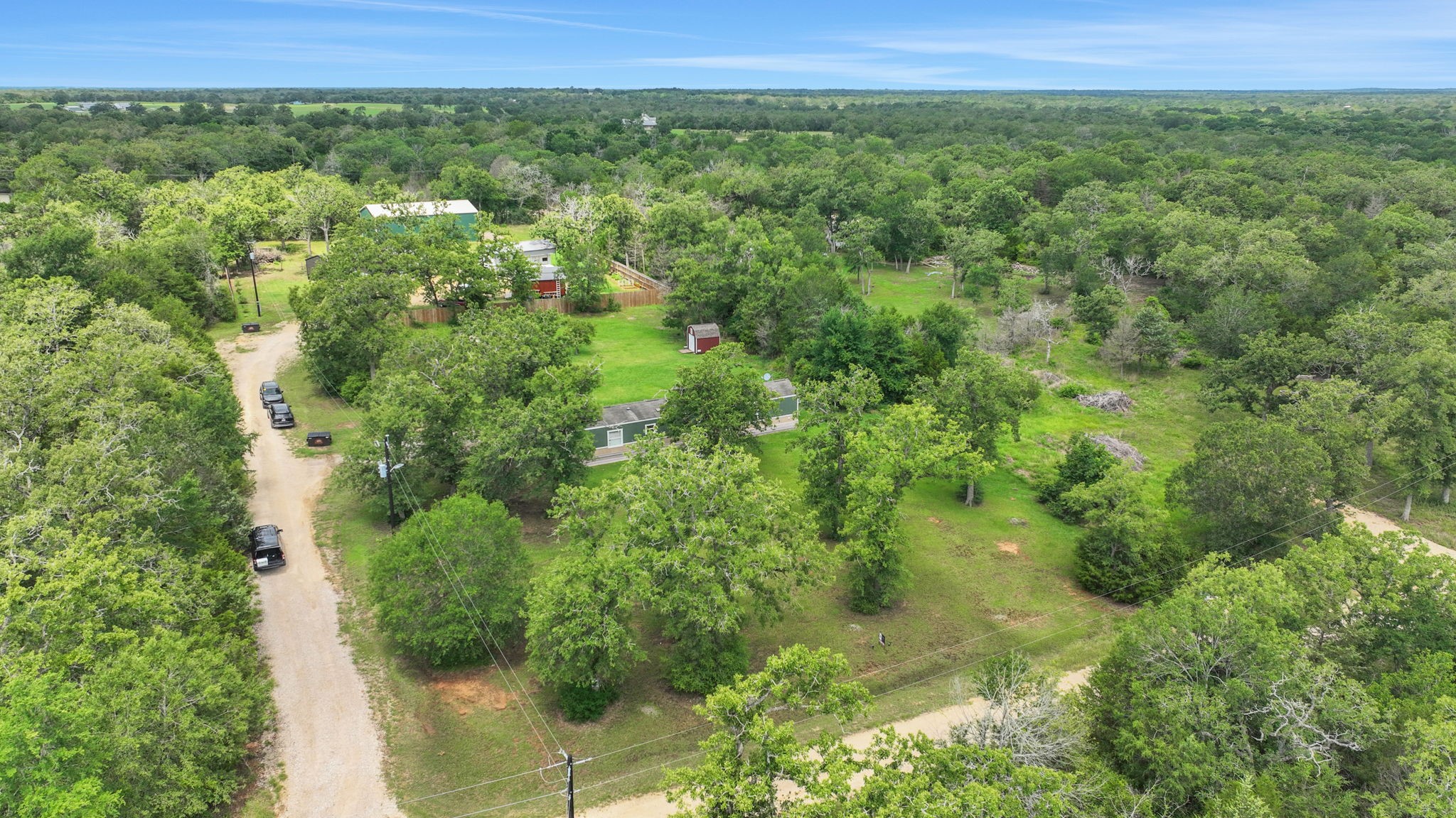 103 Sunset Lane Somerville, TX 77879 - Photo 35 of 42 a view of a green field with lots of plants
