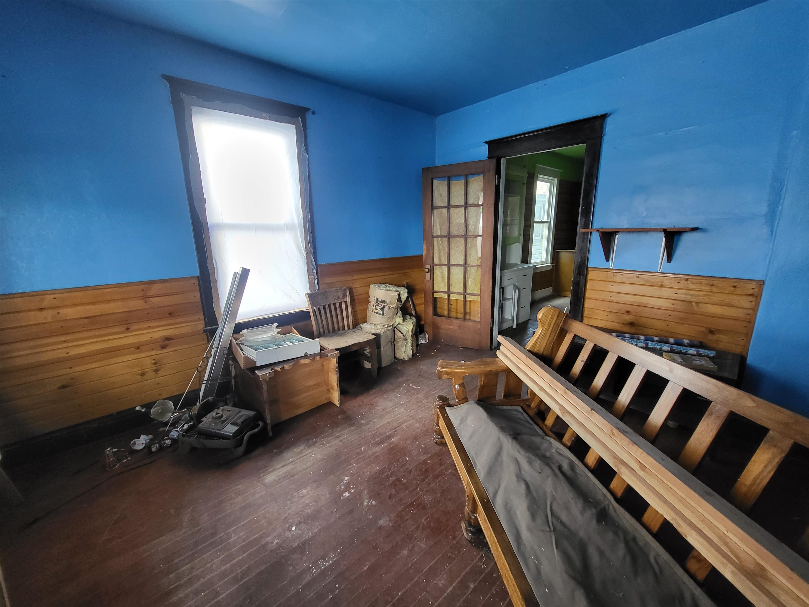 119 8th Street South Virginia, MN 55792 - Photo 9 of 18 Misc room with wood-type flooring and wainscoting