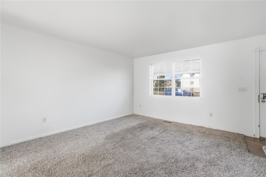 5414 Lamme Road Dayton, OH 45439 - Photo 7 of 32 This bright, inviting living space offers comfort and ample natural light, perfect for everyday living.