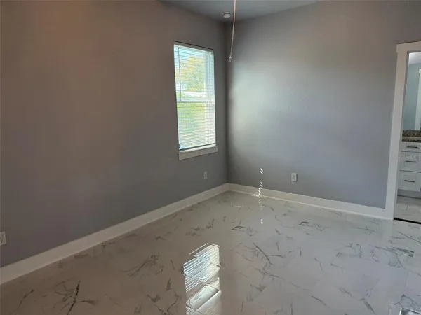 an empty room with a window