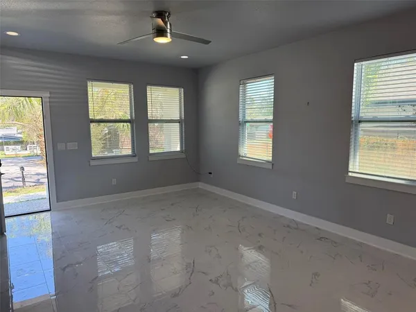 an empty room with windows