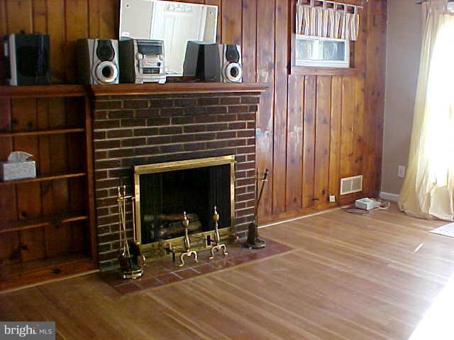 3617 Randolph Road Silver Spring, MD 20902 - Photo 4 of 16 a view of a livingroom with entryway and a fireplace